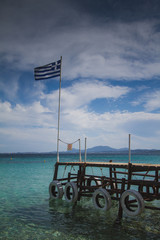 greek flag on the beach