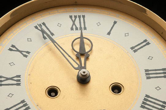 Old clock with roman numerals. - Powered by Adobe