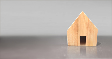 Obraz na płótnie Canvas Wooden House Model .Housing and Real Estate concept
