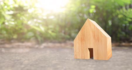 Obraz na płótnie Canvas Wooden House Model .Housing and Real Estate concept