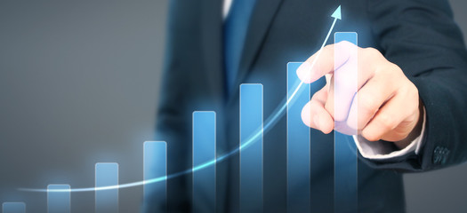 Businessman plan graph growth increase of chart positive indicators in his business