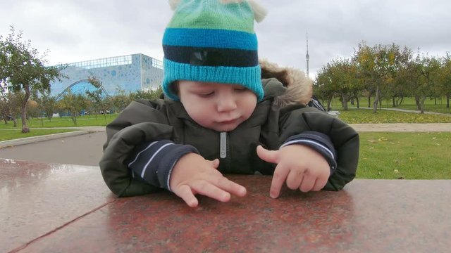 Baby boy imitate a keyboard