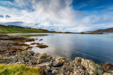 Blue skies over the bay at Scourie in the Highlands of Scotland