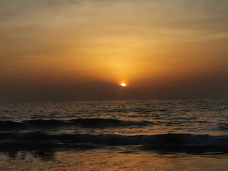 Beautiful sunset or sunrise view of sea with waves.