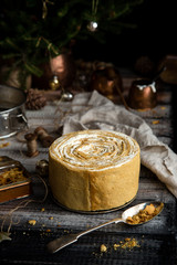 homemade tasty honey cake with vertical layers and white cream