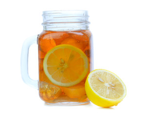 iced tea with lemon slices and mint on white background