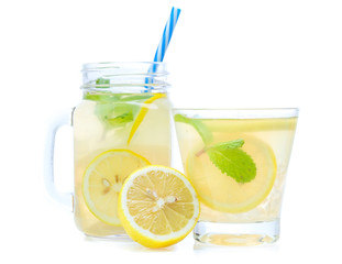 lemonade with lemons and straw isolated on a white background