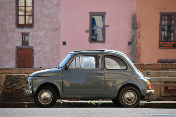 Nice little car in Italy in pastel colors