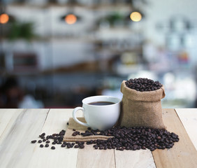 Obraz na płótnie Canvas Hot Coffee cup on the wooden table