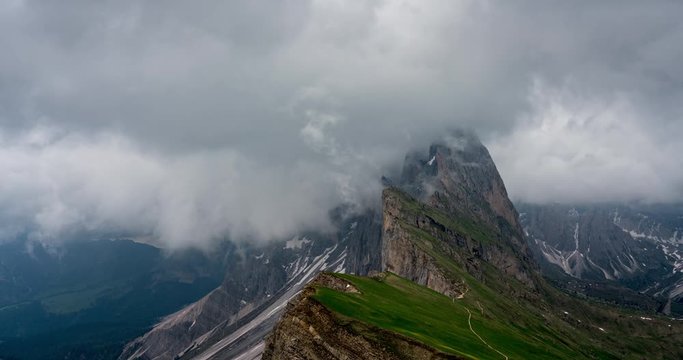 Time Lapse of Seceda ridge clouds over mountain peak 