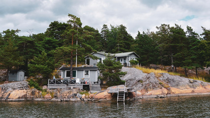 Summer house cabin in nordic archipelago nature