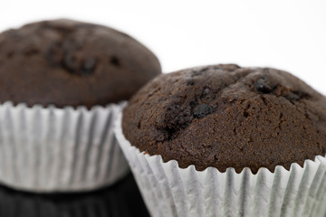 Delicious of chocolate chip cupcake isolated on black background
