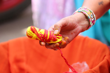 A couple doing havan or puja at home as per hindu tradition