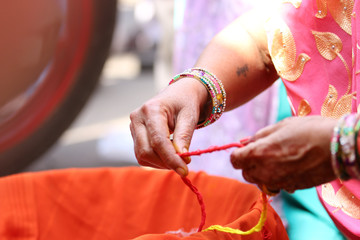 A couple doing havan or puja at home as per hindu tradition