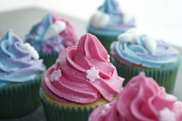 cupcakes with frosting and sprinkles