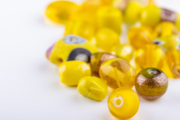 Yellow glass beads closeup