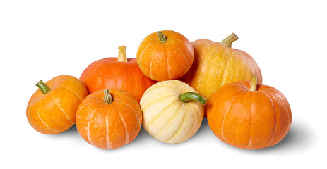 A pile of pumpkins isolated on white background. - Powered by Adobe