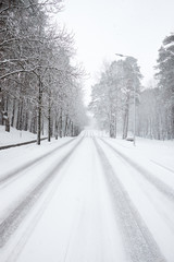 Snow covered road during snowfall