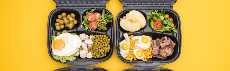 panoramic shot of eco packages with vegetables, apples, meat, fried eggs and salads isolated on yellow