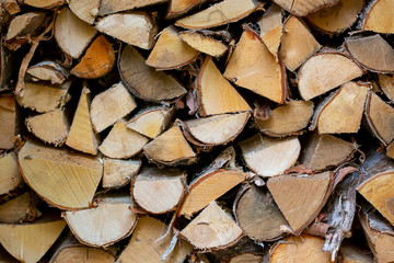 Firewood stacked. Good and natural way of warming up the house with dry birch wood.