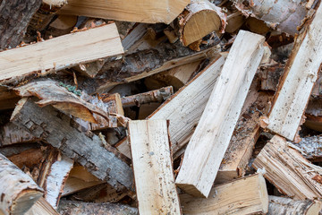Firewood stacked. Good and natural way of warming up the house with dry birch wood.