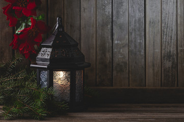 Glowing Lantern on Rusic Wooden Background