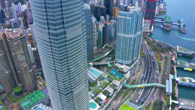 Aerial view road traffic and Hong Kong Central Financial District skyscrapers in Hong Kong, China.