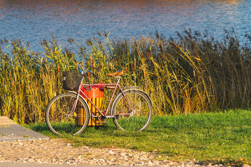 Bicycle standing on the lake bank