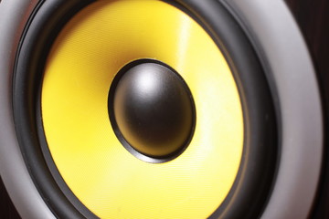 yellow subwoofer speaker,concept: loud music