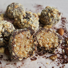 Healthy raw energy balls with cocoa, nuts. Vegan chocolate truffles.