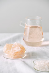 Aromatherapy. Small glass bottles with cosmetic oils. Bath salt.