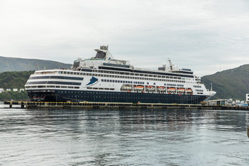 Fototapeta na wymiar ALESUND, NORWAY - Juny, 2019: Cruise in Alesund city centre. Alesund is town and municipality in More og Romsdal county, Norway