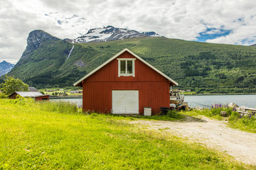 Fototapeta na wymiar Traditional norwegian red wooden house.