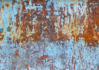 Multi-colored surface with rust elements.