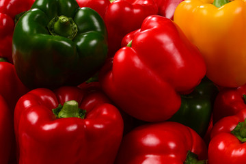 Obraz na płótnie Canvas Fresh red, green, yellow bell pepper background.