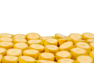 Fresh banana slices background. Top view.