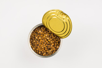Canned food on white background. Lentils.