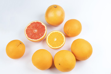 Orange grapefruit slice closeup on white background