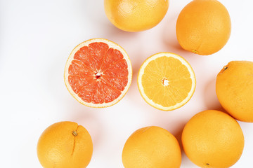 Orange grapefruit slice closeup on white background