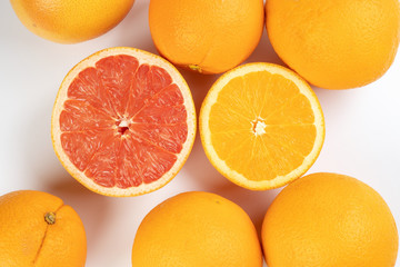 Orange grapefruit slice closeup on white background