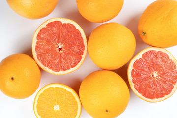 Orange grapefruit slice closeup on white background