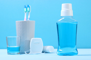 mouthwash on the table. Products to maintain oral cleanliness.