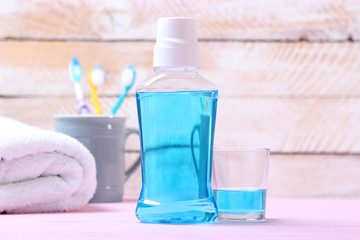 mouthwash on the table. Products to maintain oral cleanliness.