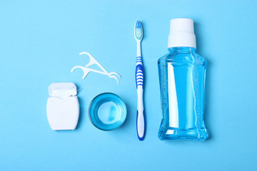 Flat composition for oral care and place for text on a light background. Dental hygiene - obrazy, fototapety, plakaty