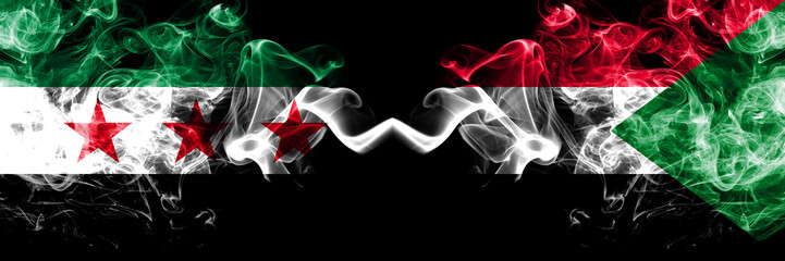 Syrian Arab Republic vs Sudan, Sudanese smoke flags placed side by side. Thick colored silky smoke flags of Syria opposition and Sudan, Sudanese