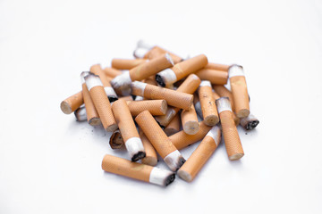 Cigarette butts isolated, stop smoke addiction concept, unhealthy pollution