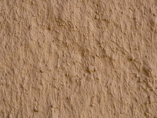 texture of a clay wall form a mud house