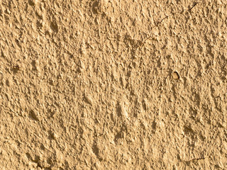 texture of a clay wall form a mud house