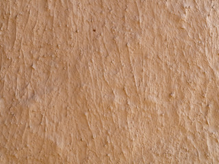 texture of a clay wall form a mud house
