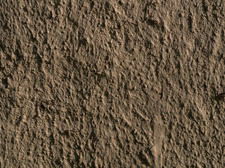 texture of a clay wall form a mud house